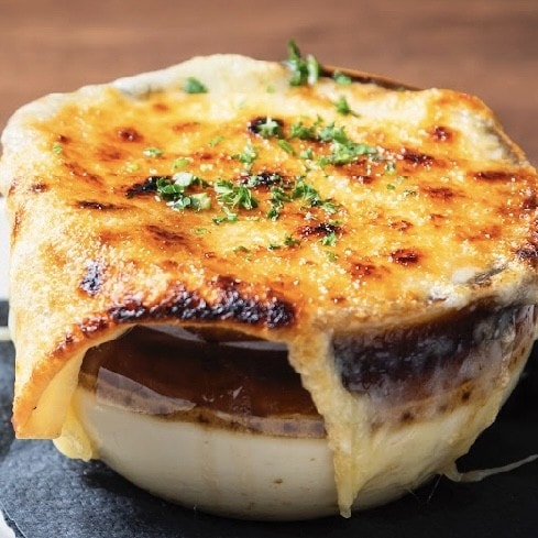 French onion soup gratinée with melted cheese.